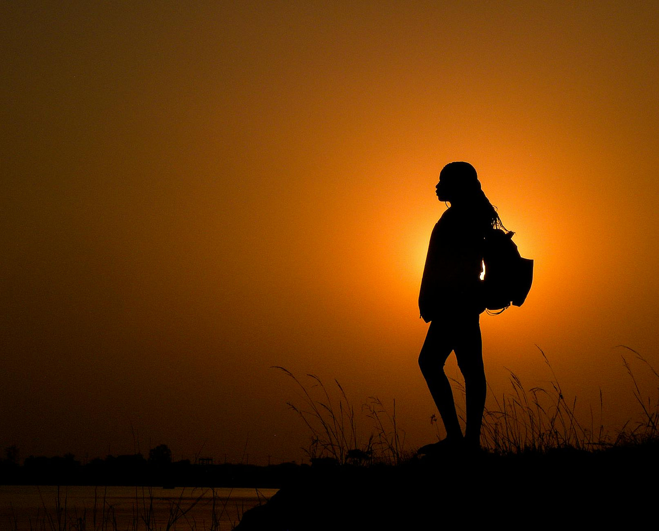 silhouette of a person at sunset in jos nigeria
