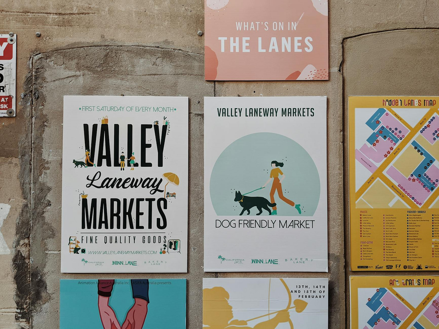 marketing posters and ads on wall