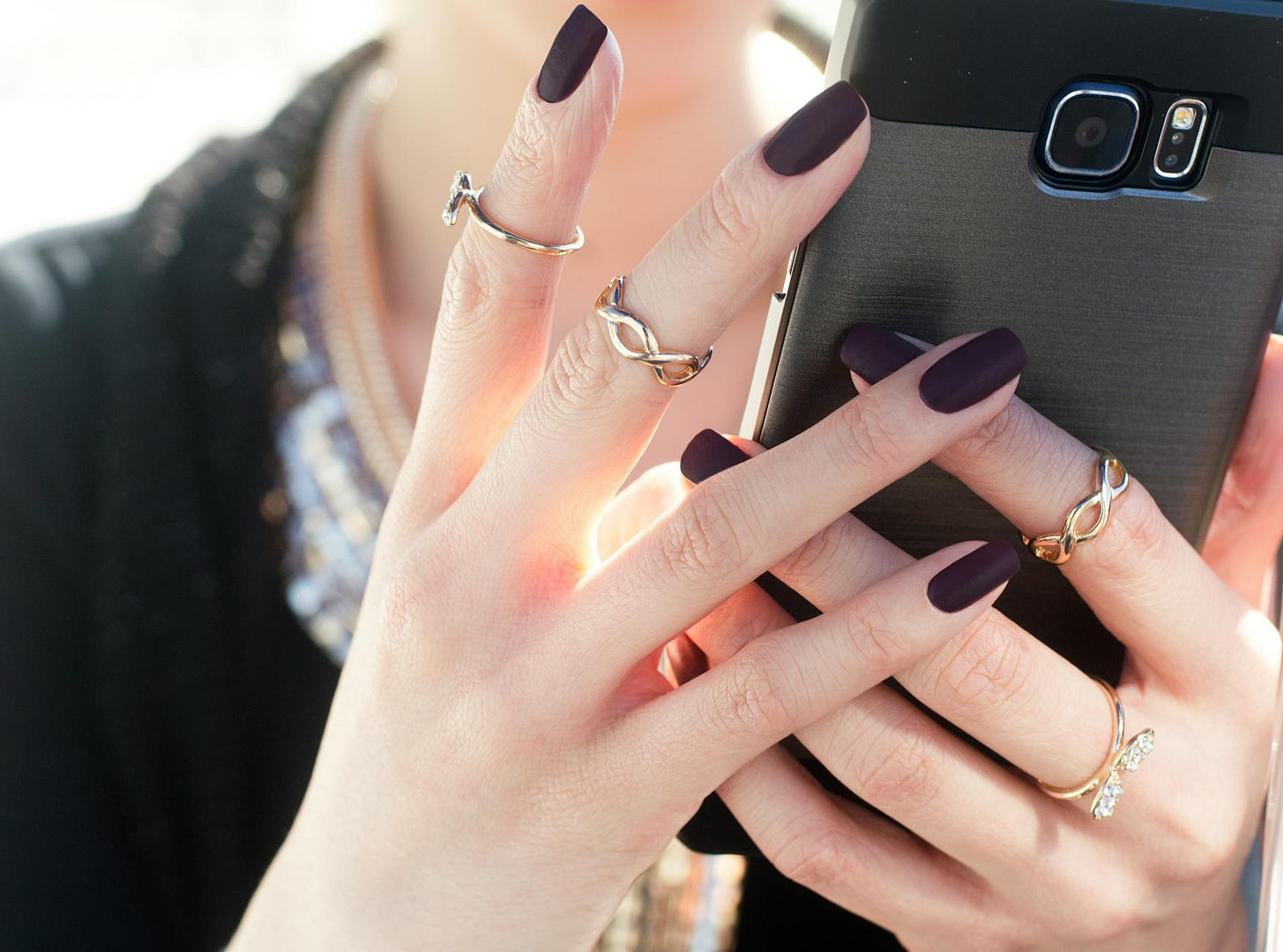 four gold colored rings