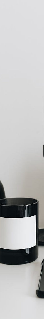 Evergreen Launch System: How to Sell Digital Products on Autopilot With a Small Email List 2 laptop and smartphone with set of white and black items