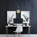 black flat screen computer monitor on white wooden table