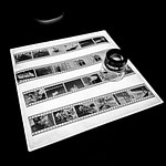 black and white film negatives with loupe