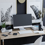 computer on brown wooden desk