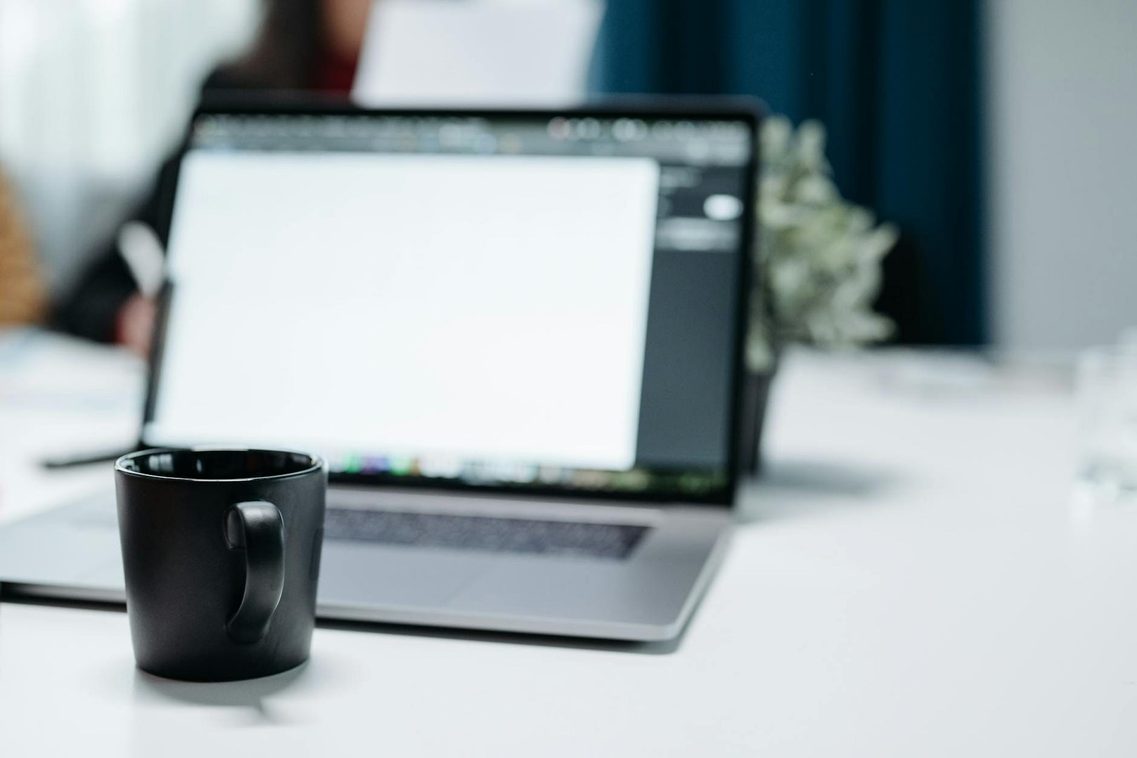 Info Products Business: How To Turn What's Already In Your Head Into Income That Shows Up While You Sleep 4 a mug beside a laptop