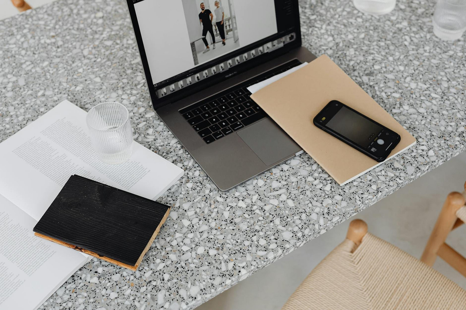 Info Product Business Strategies for Sustainable Growth and Profitability 2 brown notebook on top of black and gray laptop