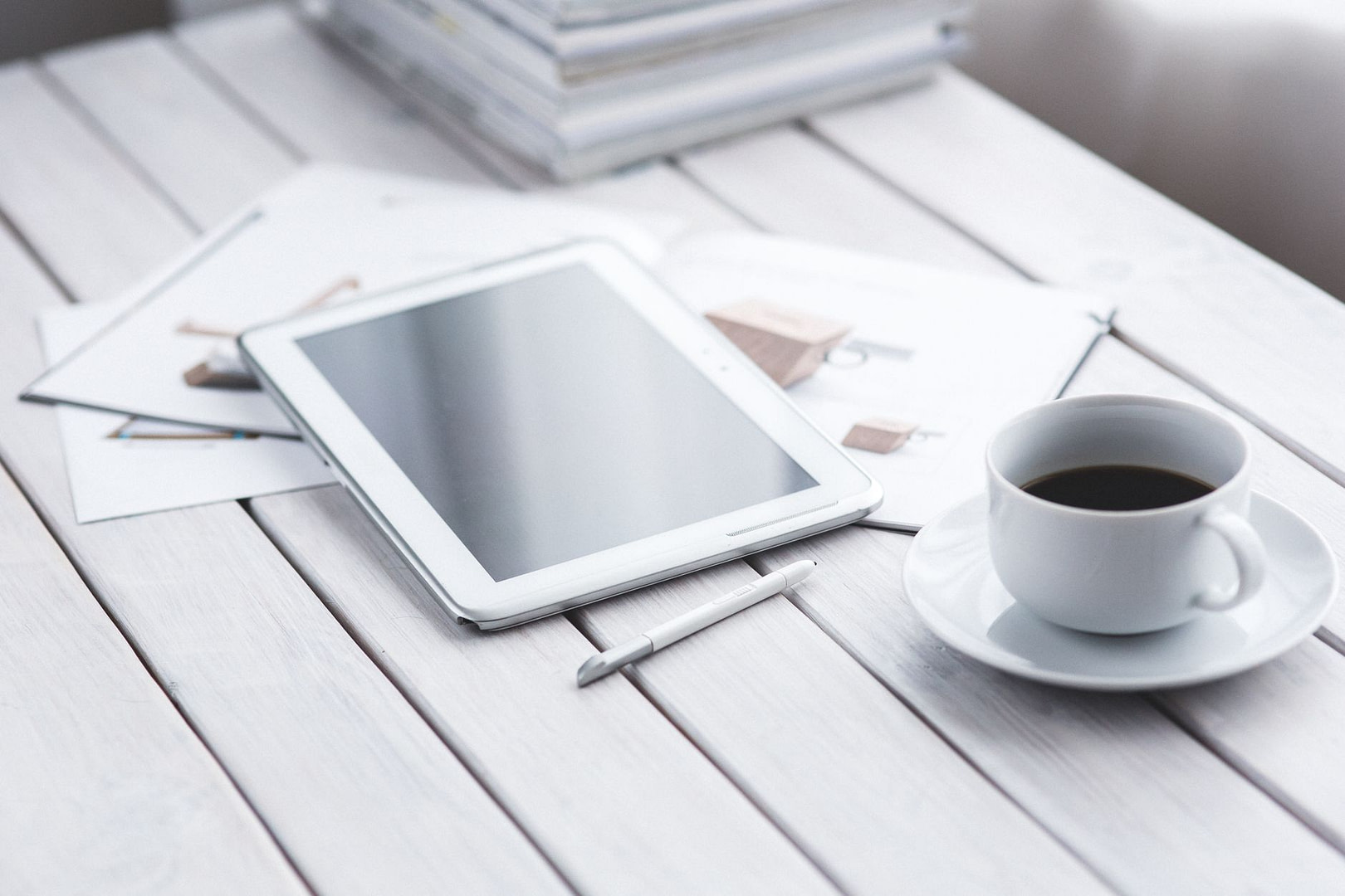 Blog Headlines That Get Clicks — 2026 Blueprint 2 white tablet and cup of coffee