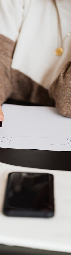 Getting Email Subscribers: Proven Strategies for Growing Your Blog's Mailing List 1 crop elegant business lady taking notes while sitting at desk