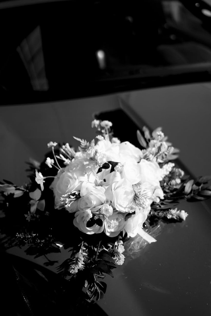 The Brutal Truth About Why You're Still Broke (And The Dirty Little Secret That Changed Everything) 10 black and white bridal bouquet on car hood