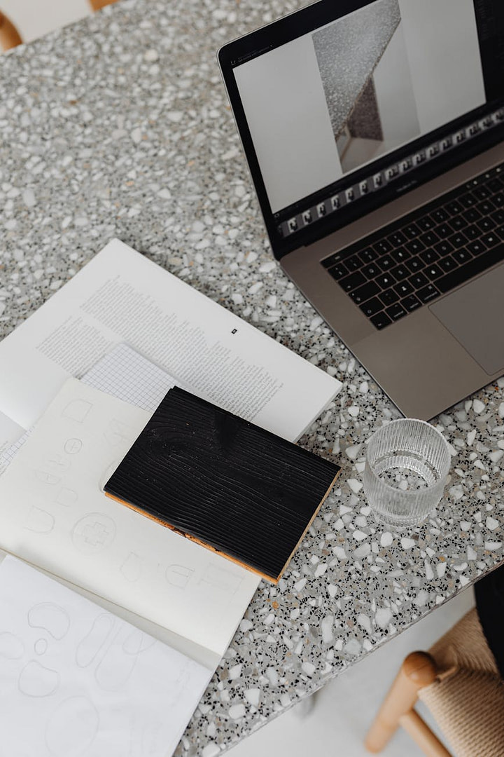 Market Research for Digital Products: The Launch Blueprint 13 silver and black laptop beside a clear glass with water