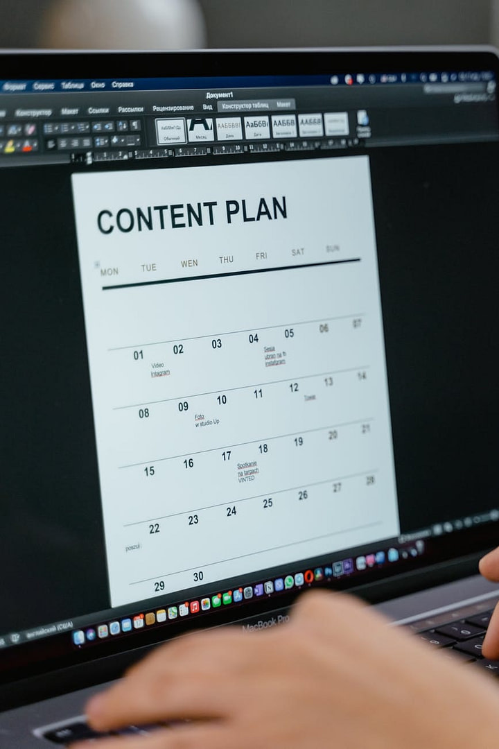 The "Lazy Blogger's" Content Calendar That Prints Money While You Sleep (No BS Version) 14 a person planning a schedule