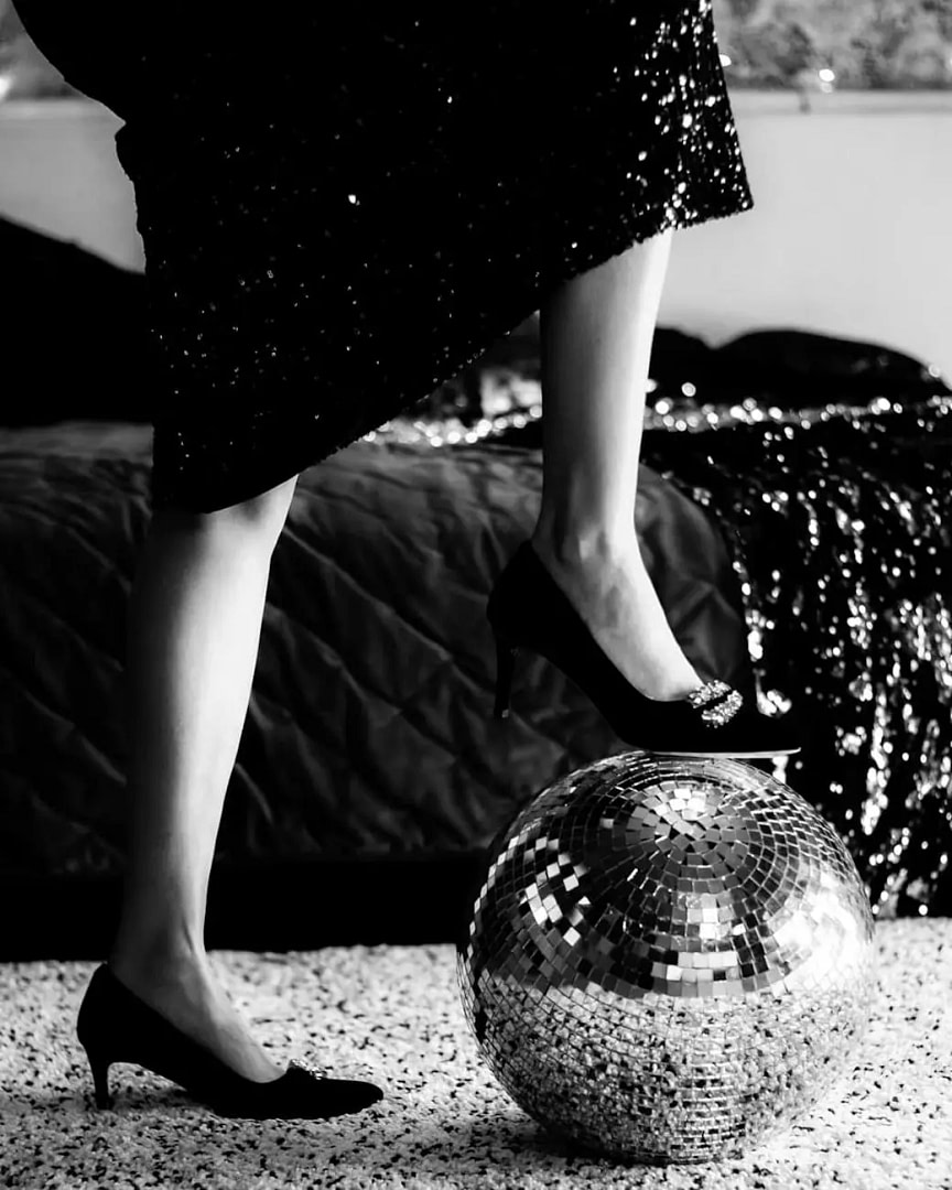 $47,000 Online Mistake: 10 Ways to Boost Your Online Biz 1 grayscale photo of person stepping on a disco ball