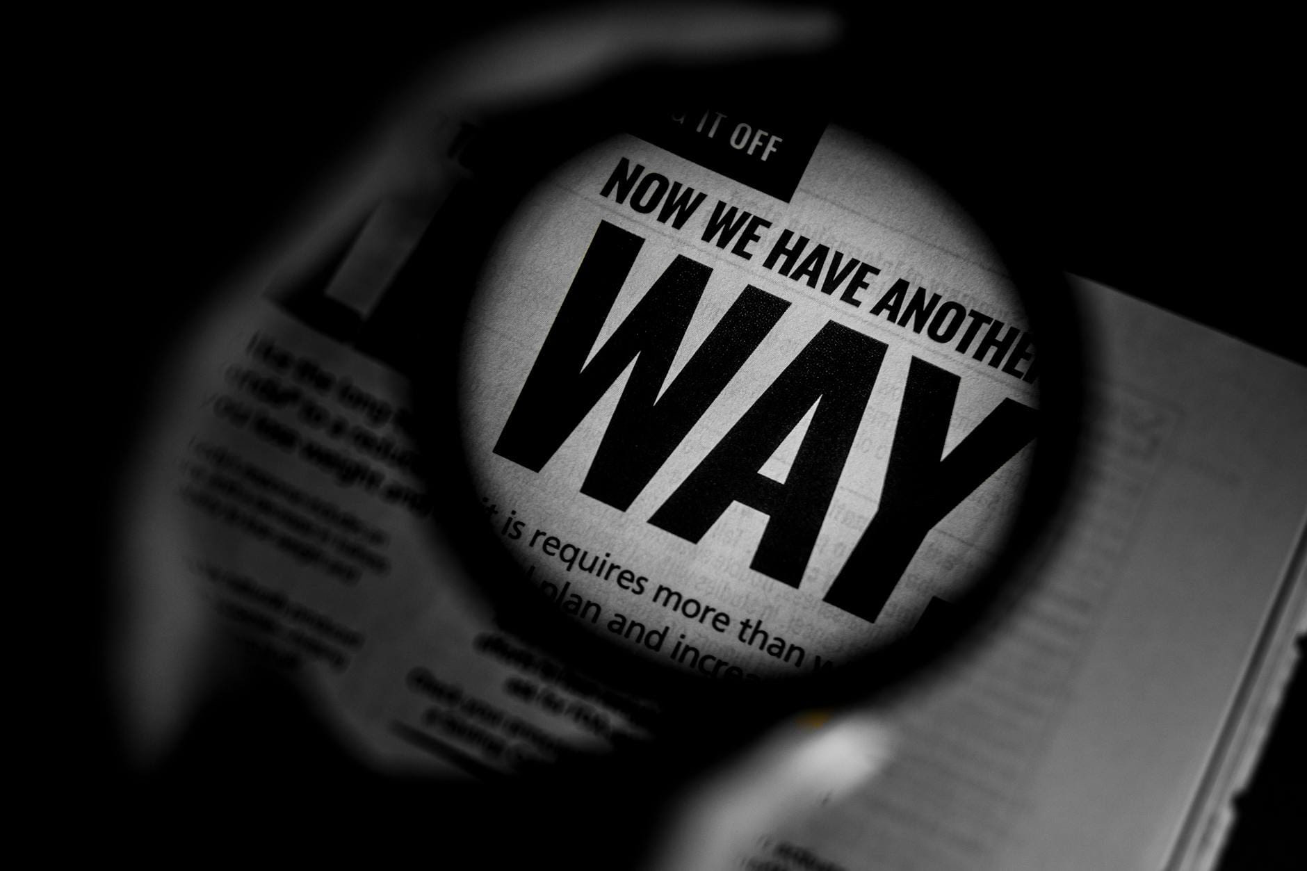 Craft Engaging Blog Post Headlines: A Practical Guide to Boost Traffic & Subscribers a magazine texts through the magnifying glass