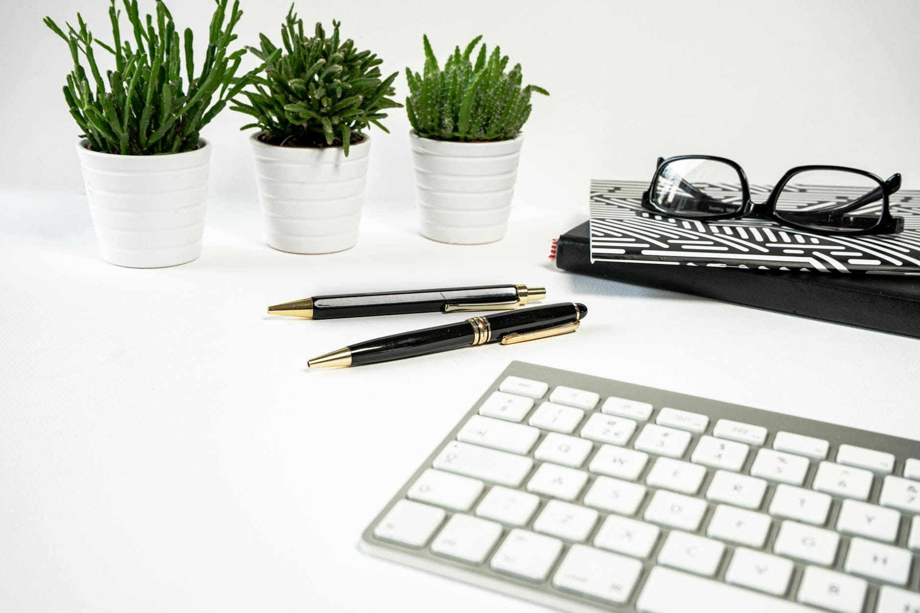 Validate a Digital Product Idea modern workspace with plants and stationery
