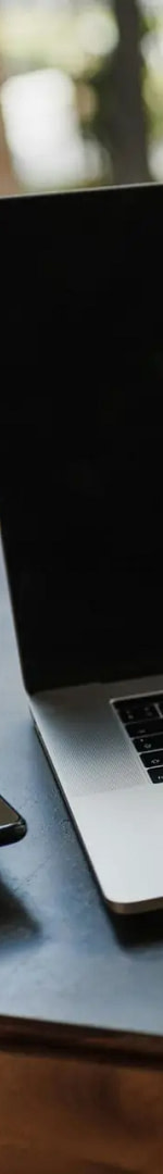 The Beginner’s Guide to SEO for Blogs (2025 Edition: Simple, Non-Techy, No Fluff) 10 Workspace setup featuring a laptop, notepad, glasses, and coffee cup for productivity.