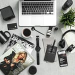 flatlay of assorted modern device items